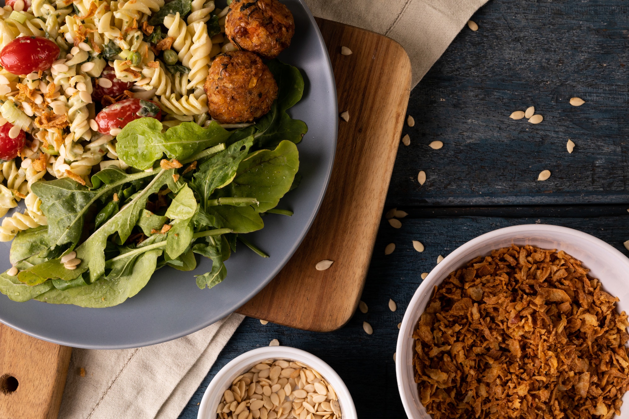 Overhead view of fresh italian meal served in bowl on wooden table