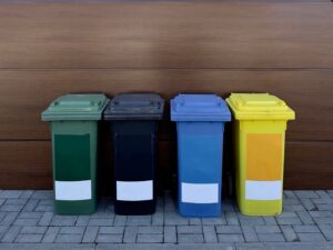 Garbage sorting containers with space for text