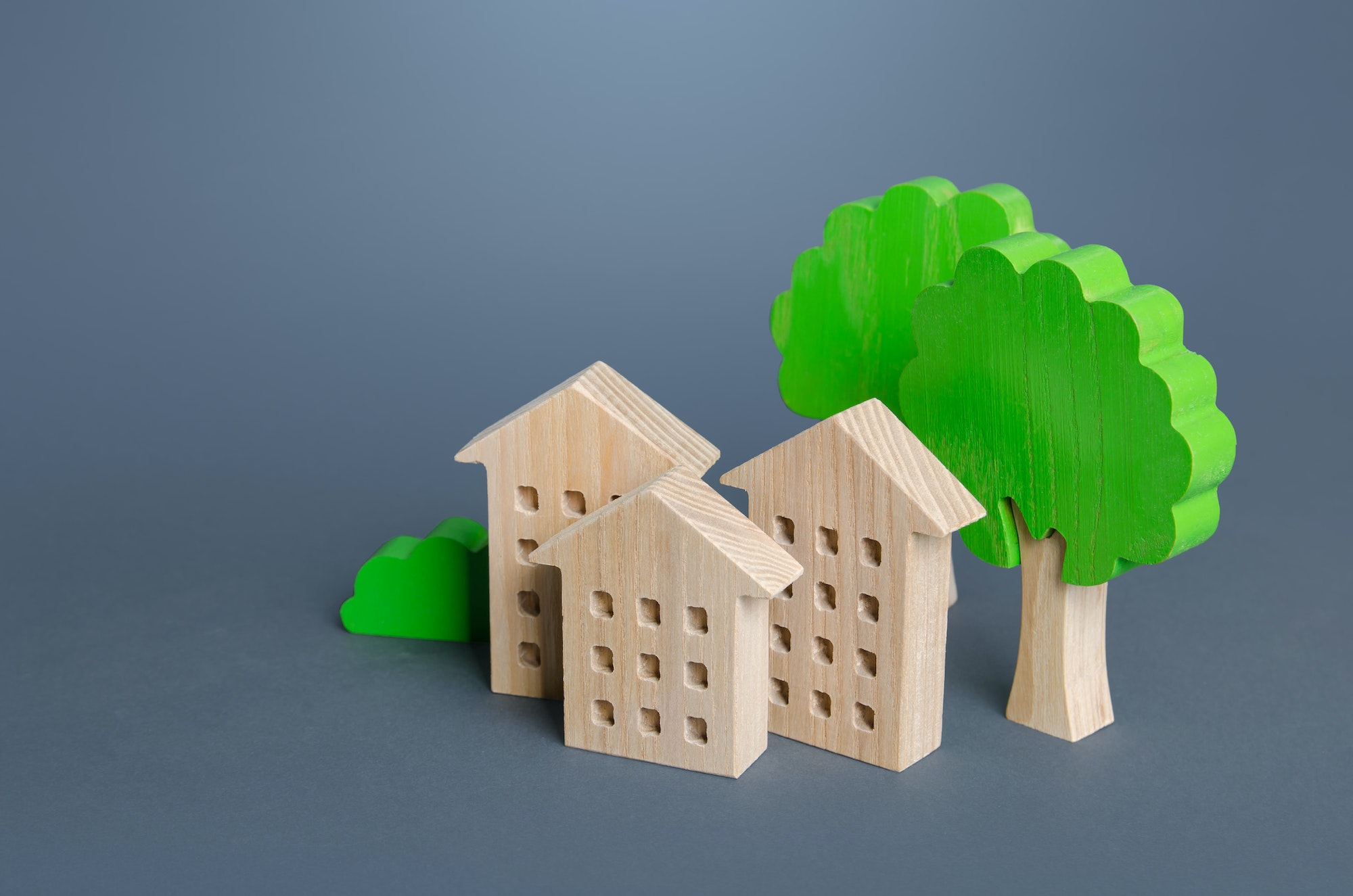Residential buildings among the trees. Environmentally friendly, energy efficiency