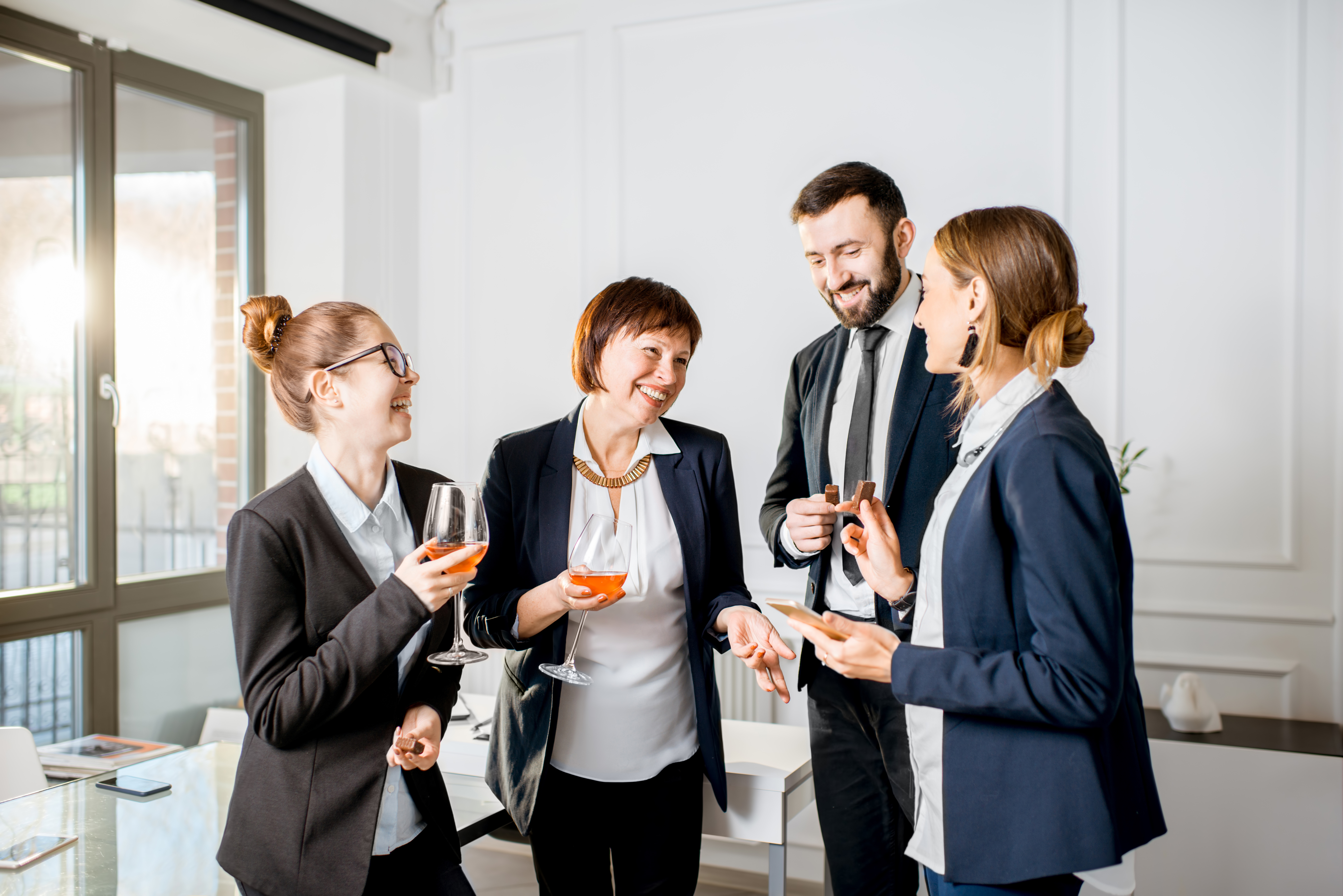 Business people during the meeting with drinks in the office